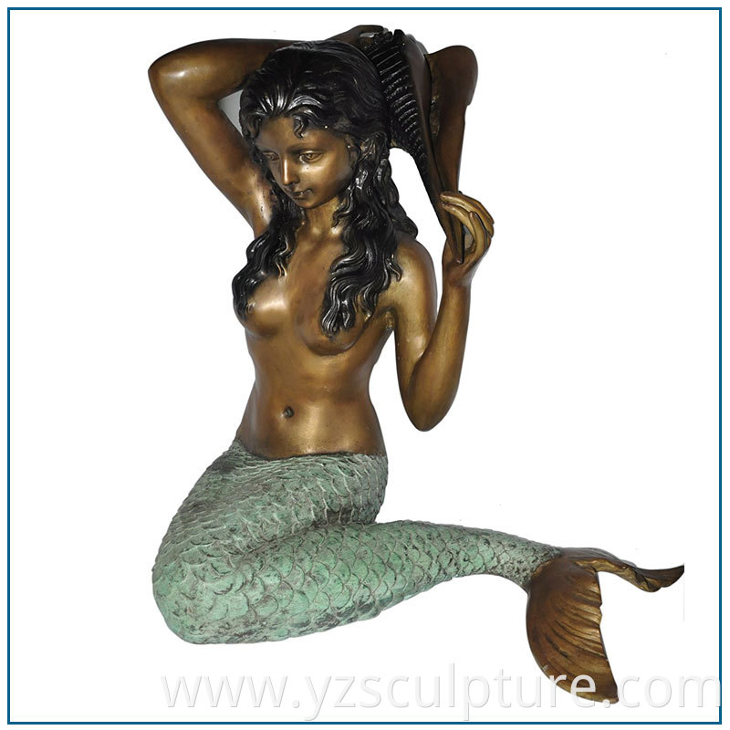 bronze mermaid statue